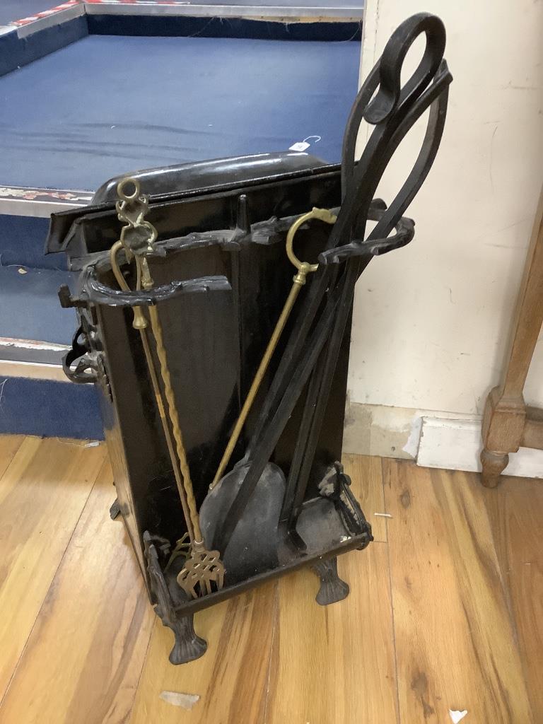 A black toleware coal scuttle, height 59cm, and various fire tools